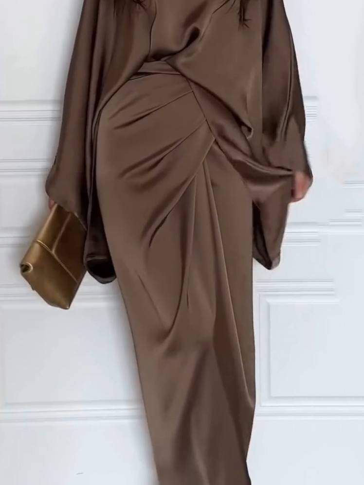 Effortless Chic Two-Piece Outfit with Loose Shirt and Lace-Up Skirt