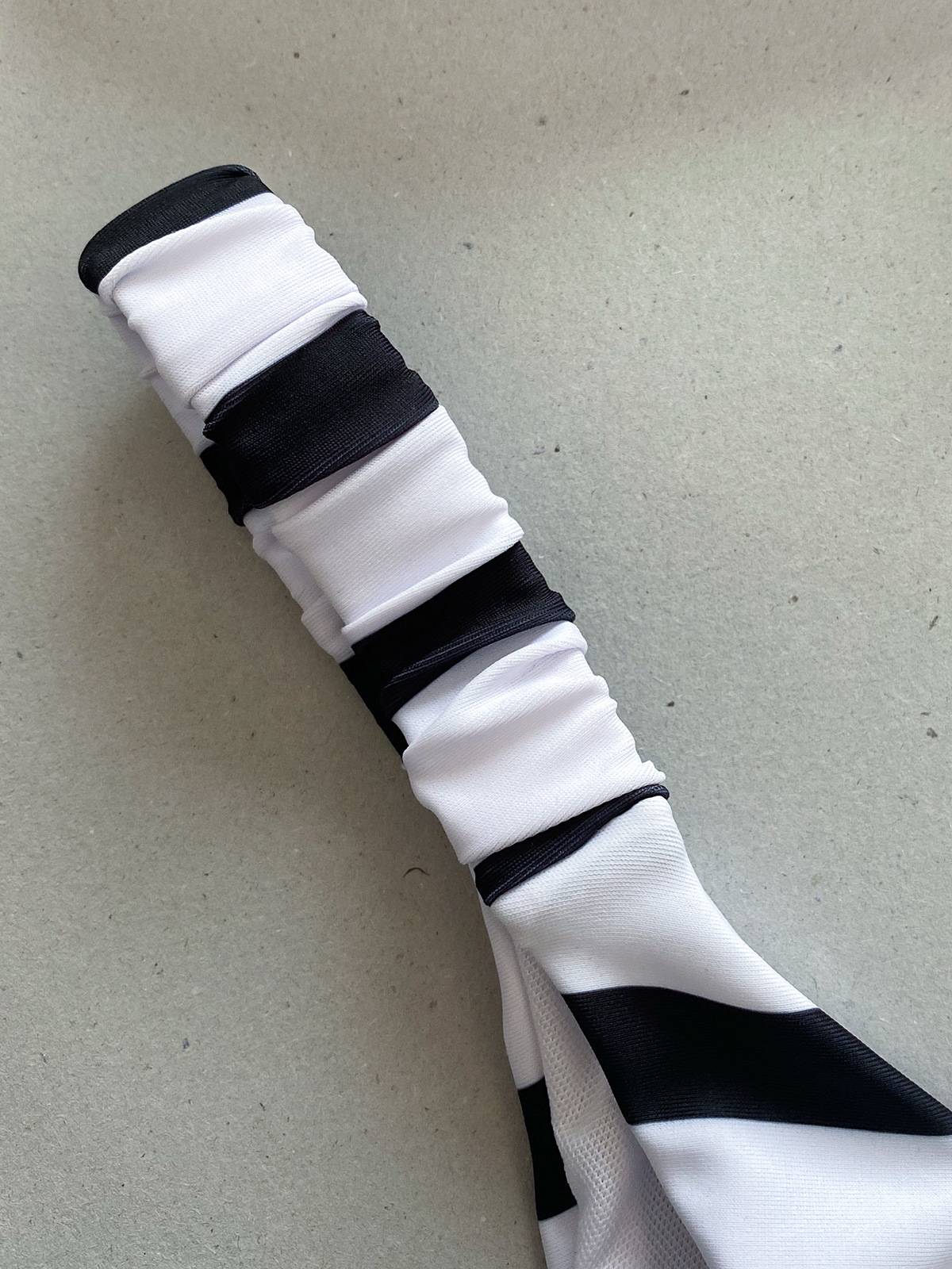 Elegant White Striped Bandeau Bikini with Floral Accent