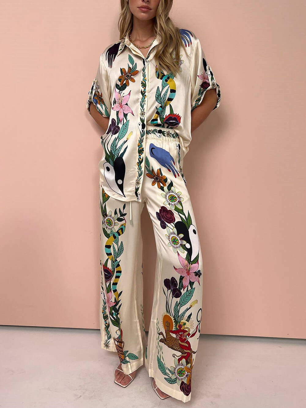Elegant Satin Wide-Leg Pants with Artistic Print and Elastic Waist