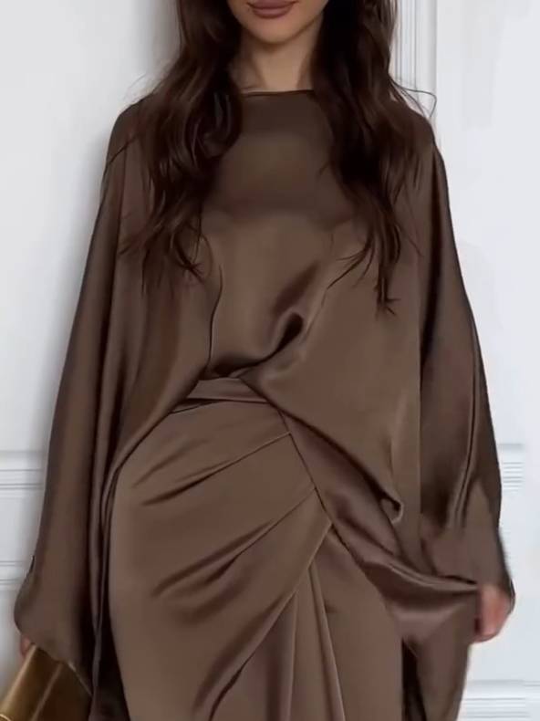 Effortless Chic Two-Piece Outfit with Loose Shirt and Lace-Up Skirt